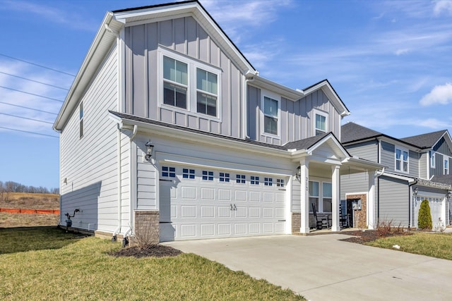 view of front facade with a garage and a front yard