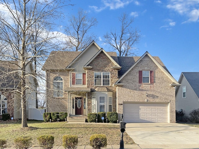 front facade with a garage and a front lawn