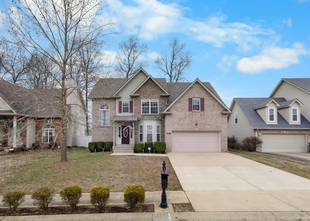 view of front facade with a garage and a front yard