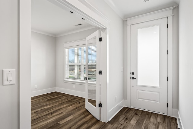 entryway featuring dark hardwood / wood-style flooring and ornamental molding