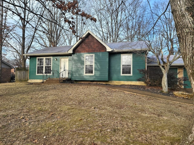 view of front of home with a front yard