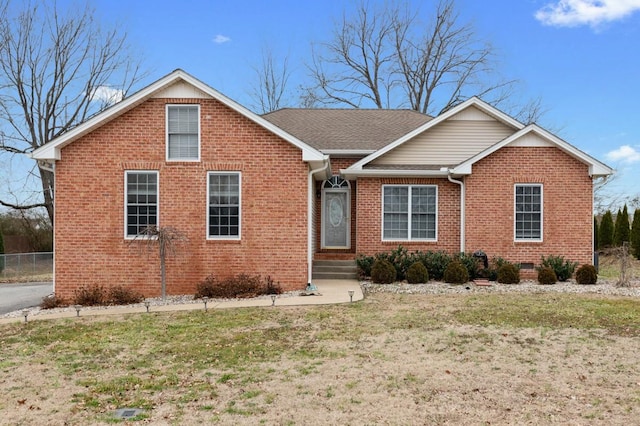 view of front of property with a front lawn