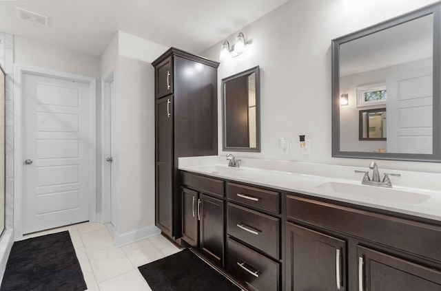 bathroom featuring vanity and tile patterned flooring