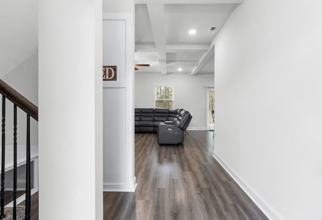 hall with hardwood / wood-style flooring, coffered ceiling, and beam ceiling