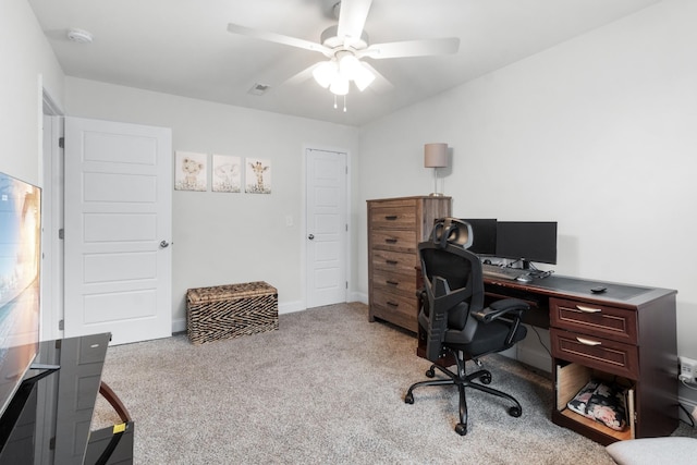 home office featuring ceiling fan and light colored carpet