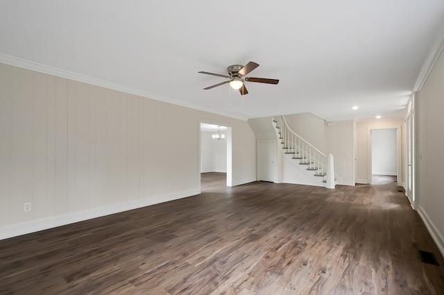 unfurnished living room featuring crown molding, dark hardwood / wood-style floors, and ceiling fan with notable chandelier