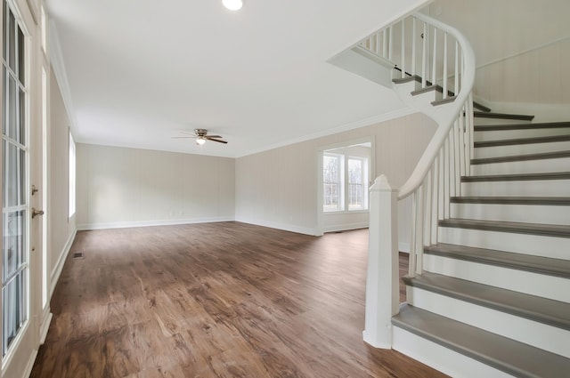 interior space featuring hardwood / wood-style flooring, ceiling fan, and ornamental molding