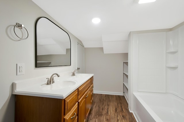 bathroom featuring vanity and hardwood / wood-style floors