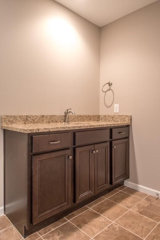 bathroom featuring vanity and tile patterned floors