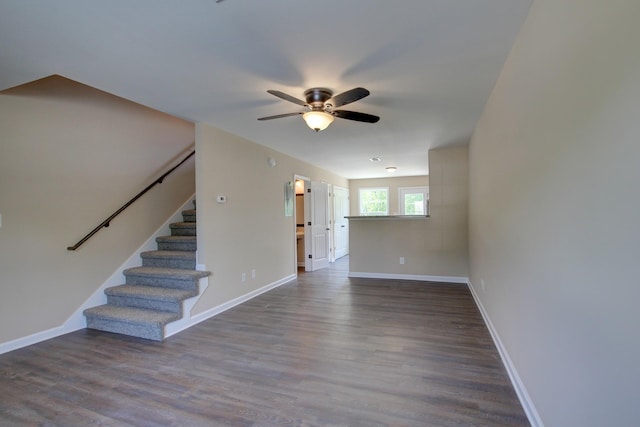 interior space with wood-type flooring and ceiling fan