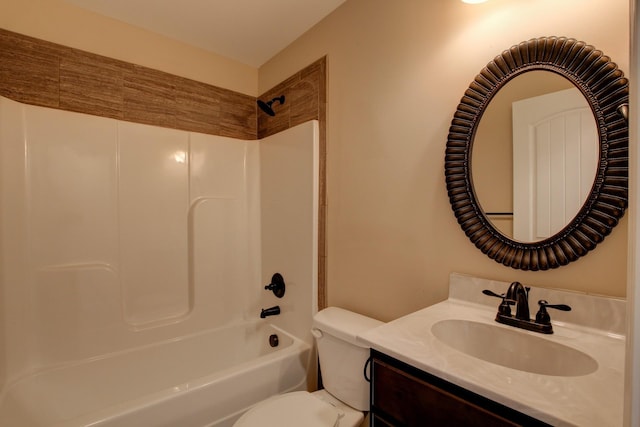 full bathroom featuring vanity, tub / shower combination, and toilet