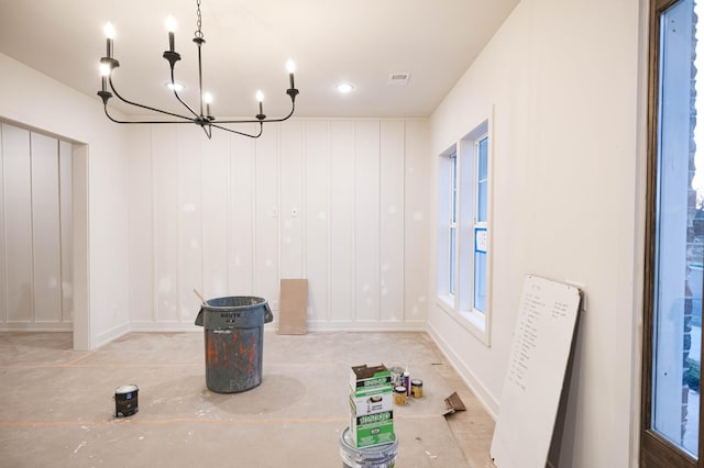 dining room featuring a chandelier and visible vents