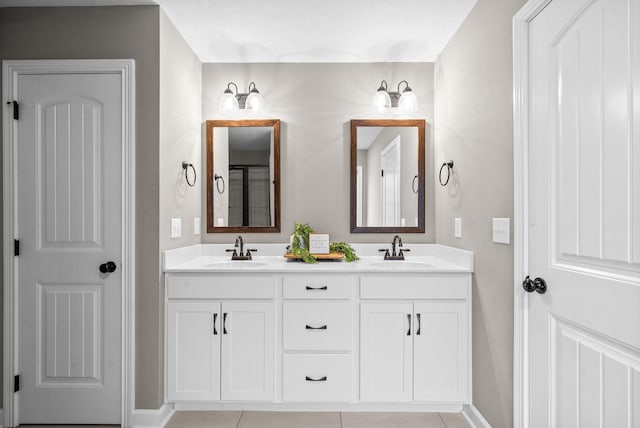 bathroom featuring vanity and tile patterned flooring