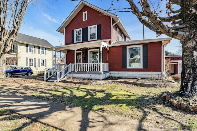 front of property featuring covered porch