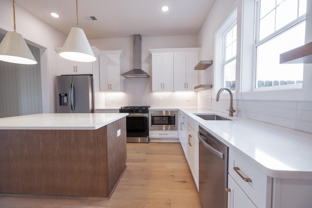4044 Penfield Dr Unit C, Franklin, TN 37069 - kitchen with wall chimney range hood, stainless steel appliances, tasteful backsplash, and a sink