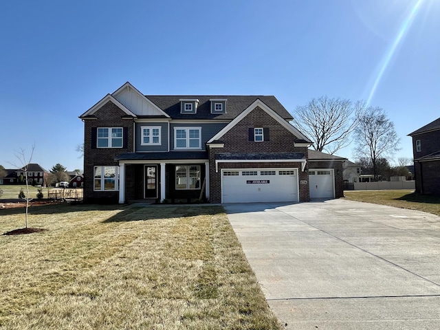 view of front facade featuring driveway, brick siding, a front lawn, and fence