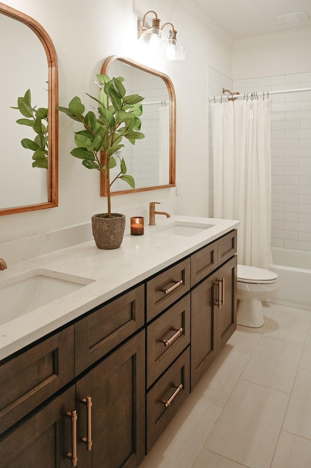 full bathroom with shower / bathtub combination with curtain, vanity, tile patterned flooring, and toilet