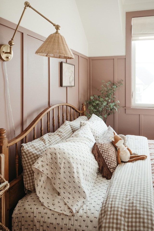 bedroom with vaulted ceiling