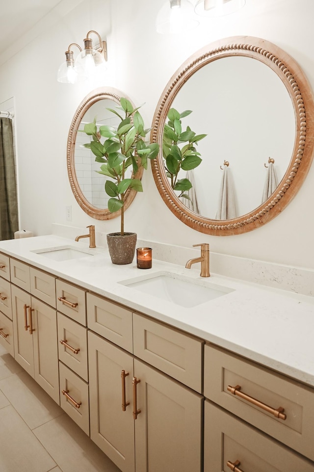 bathroom with tile patterned flooring and vanity