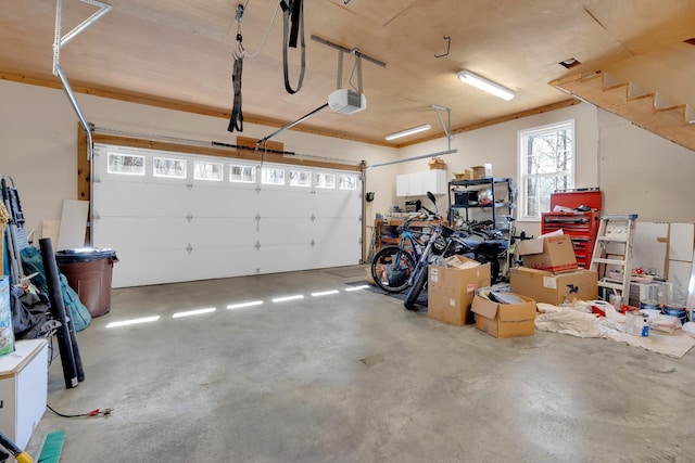 garage featuring a garage door opener