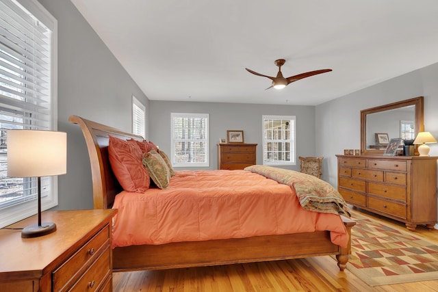 bedroom featuring light hardwood / wood-style floors and ceiling fan