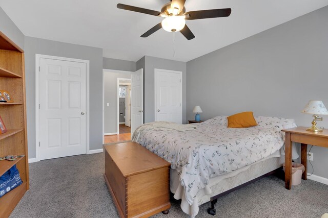 carpeted bedroom featuring ceiling fan