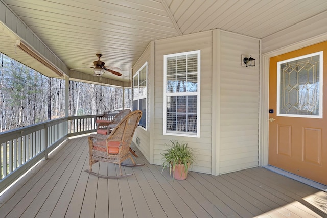 wooden deck with ceiling fan