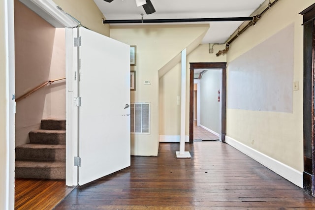 interior space with dark hardwood / wood-style floors and ceiling fan