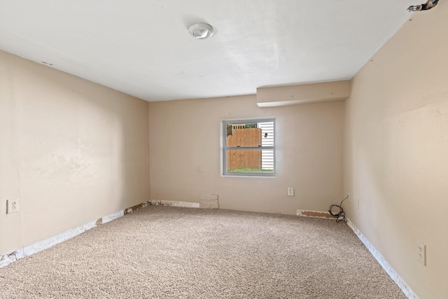 spare room featuring carpet flooring