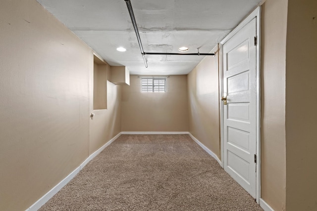 basement with carpet flooring