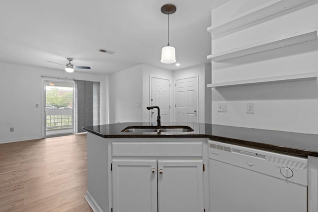 474 S Main St Unit 203, Ashland City, TN 37015 - kitchen with white cabinetry, sink, dishwasher, and light wood-type flooring