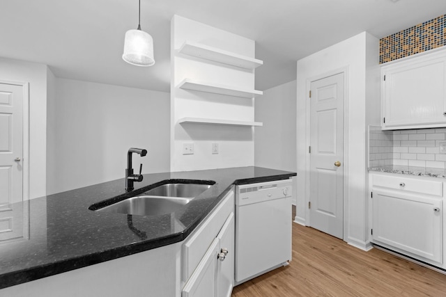 474 S Main St Unit 203, Ashland City, TN 37015 - kitchen featuring sink, white cabinetry, light hardwood / wood-style flooring, white dishwasher, and pendant lighting