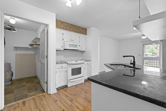 474 S Main St Unit 203, Ashland City, TN 37015 - kitchen with white cabinetry, sink, white appliances, and ceiling fan