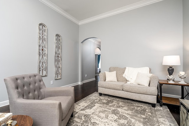 living room with ornamental molding and dark wood-type flooring