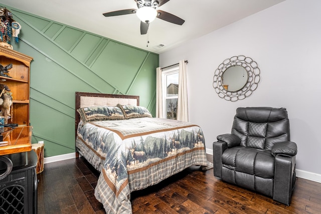 bedroom featuring dark hardwood / wood-style floors and ceiling fan