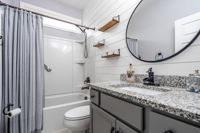 full bathroom with toilet, vanity, and shower / bathtub combination with curtain