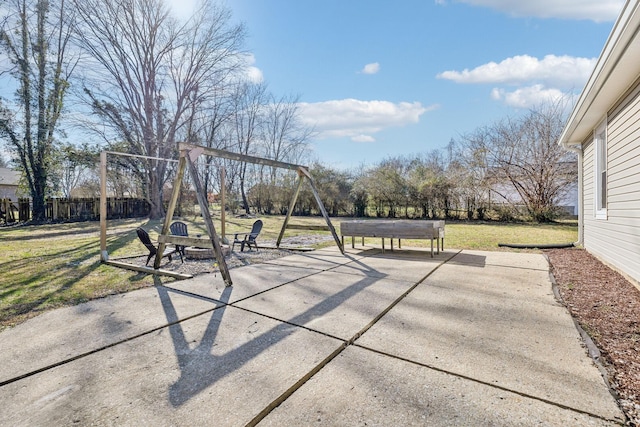 view of patio / terrace featuring fence