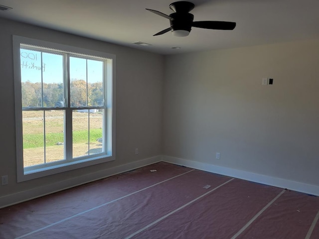 empty room featuring ceiling fan