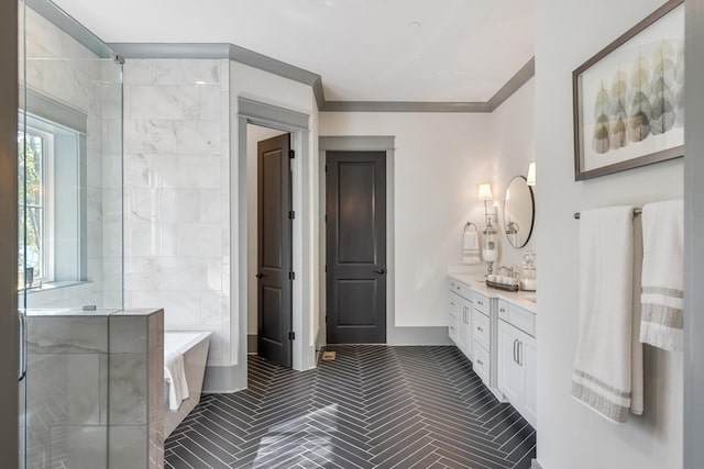 bathroom with vanity, ornamental molding, and shower with separate bathtub