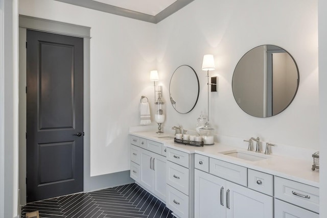 bathroom with vanity and tile patterned floors