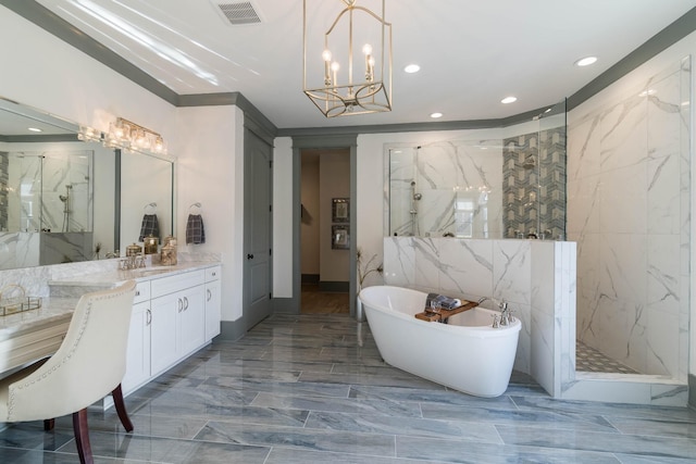 bathroom featuring an inviting chandelier, vanity, plus walk in shower, and tile walls