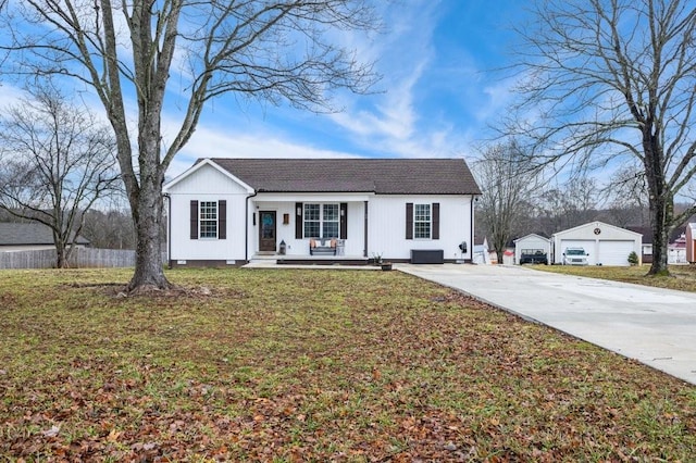 view of front of property with covered porch and a front lawn