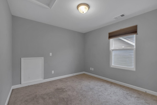 view of carpeted spare room