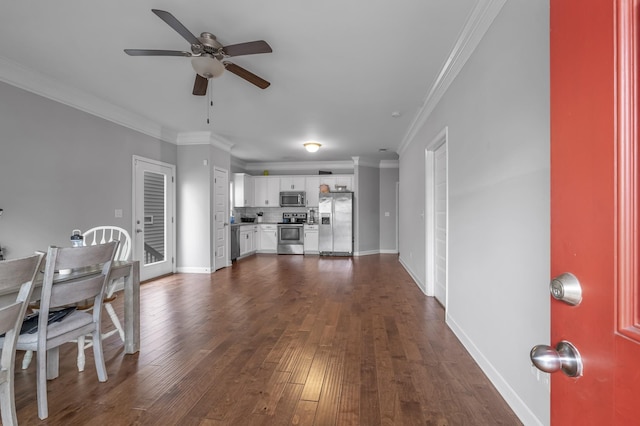 living room with ceiling fan, ornamental molding, and dark hardwood / wood-style floors