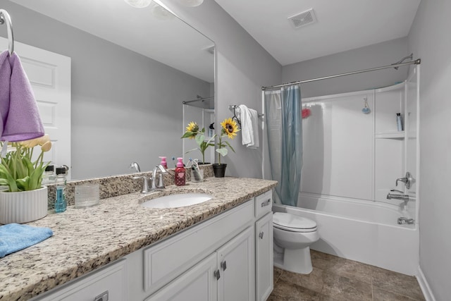 full bathroom with vanity, toilet, and shower / bath combo with shower curtain