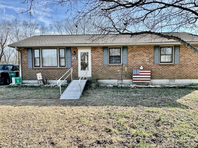 view of front of home featuring a front lawn