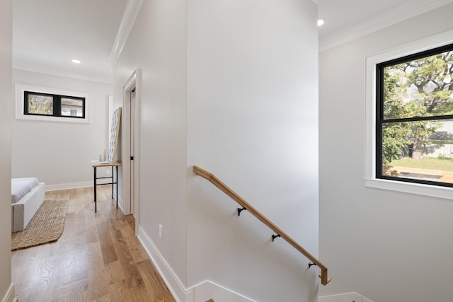 stairs featuring recessed lighting, baseboards, crown molding, and wood finished floors