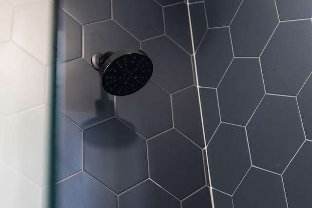 details with a tile shower