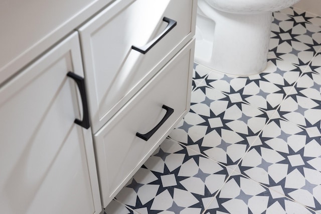 details with tile patterned floors