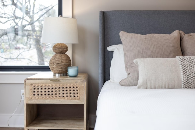 bedroom with multiple windows